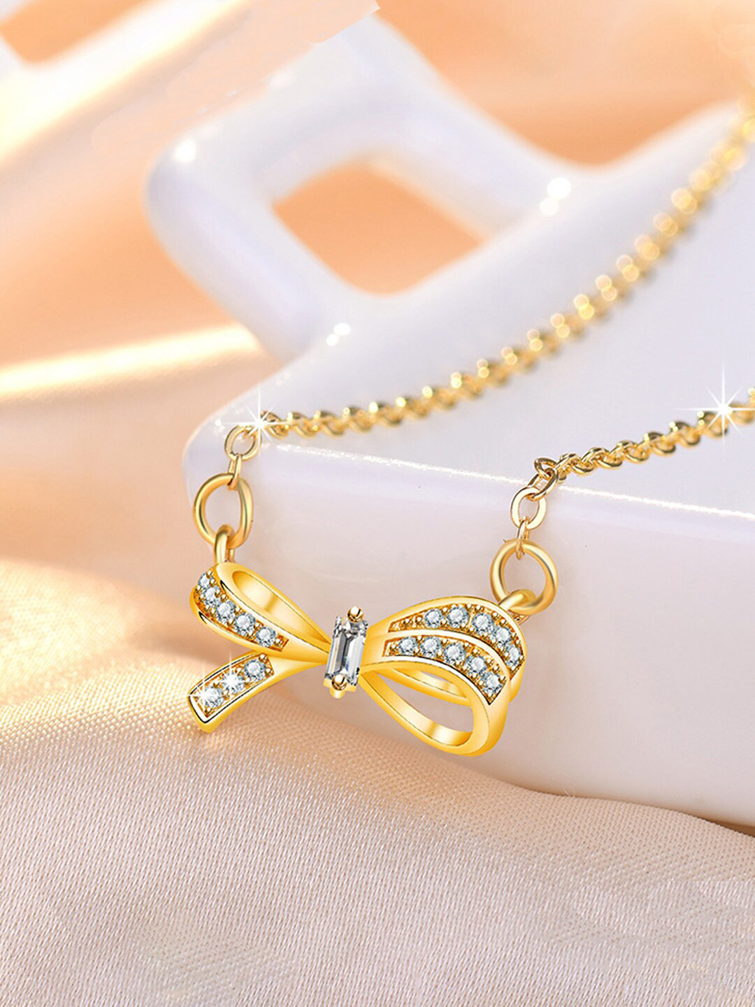 Jewels Galaxy Gold-Plated American Diamond Studded Bow Design Necklace