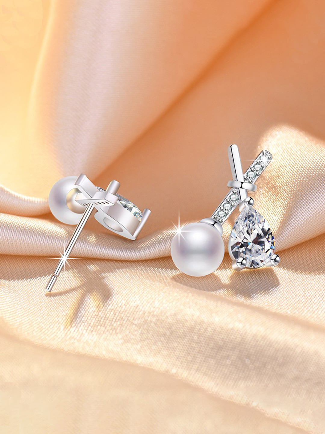 Jewels Galaxy Silver-Toned Contemporary Studs Earrings