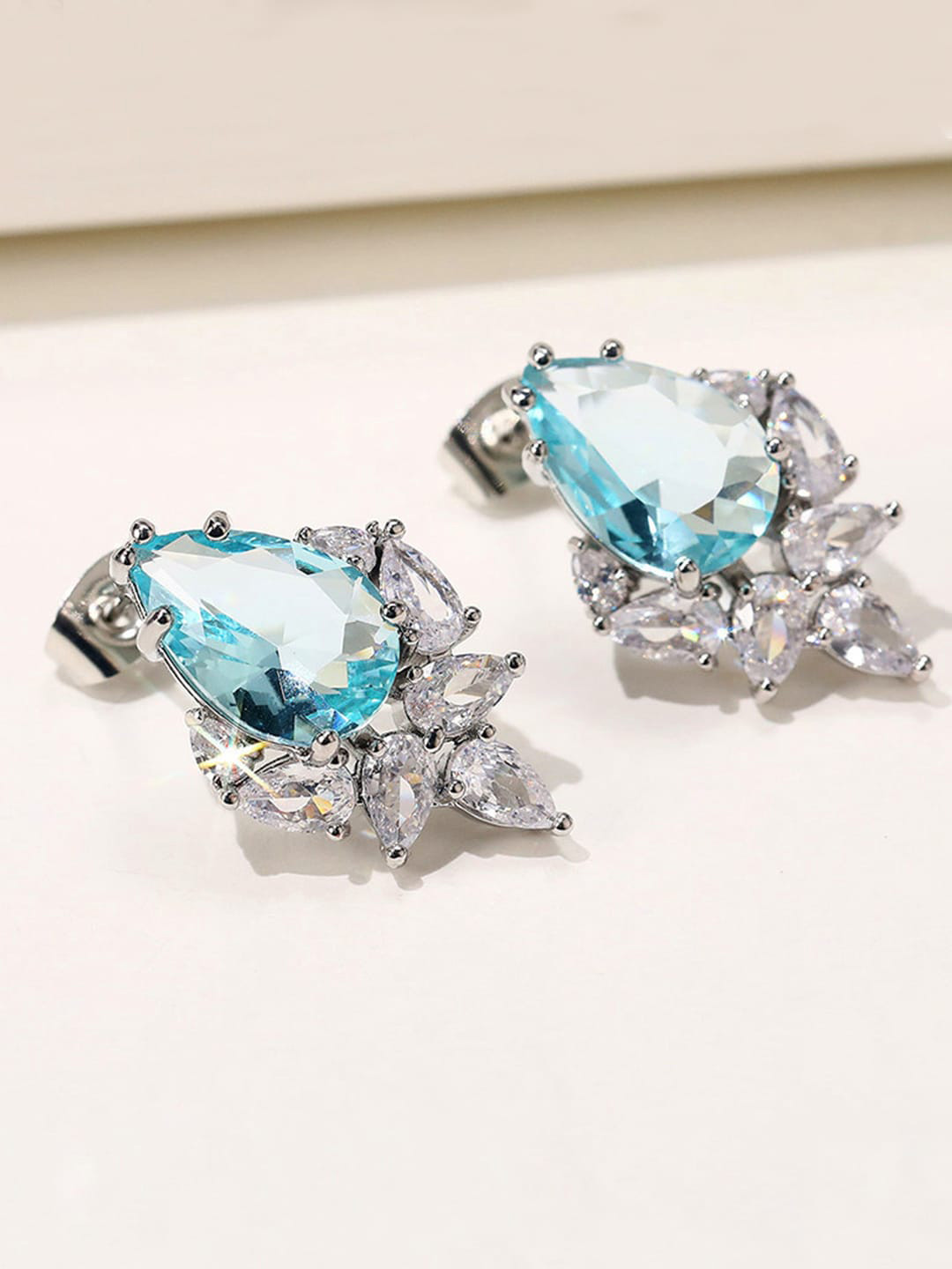 Jewels Galaxy Teardrop Shaped Studs Earrings