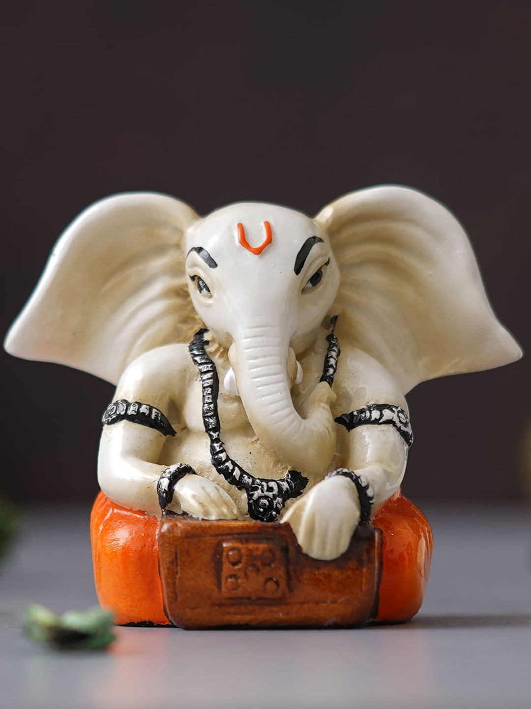 eCraftIndia Lord Ganesha Idol Playing Harmonium Orange Polyresin Glossy Prayer Room Music Medium Showpiece - 3 Inches