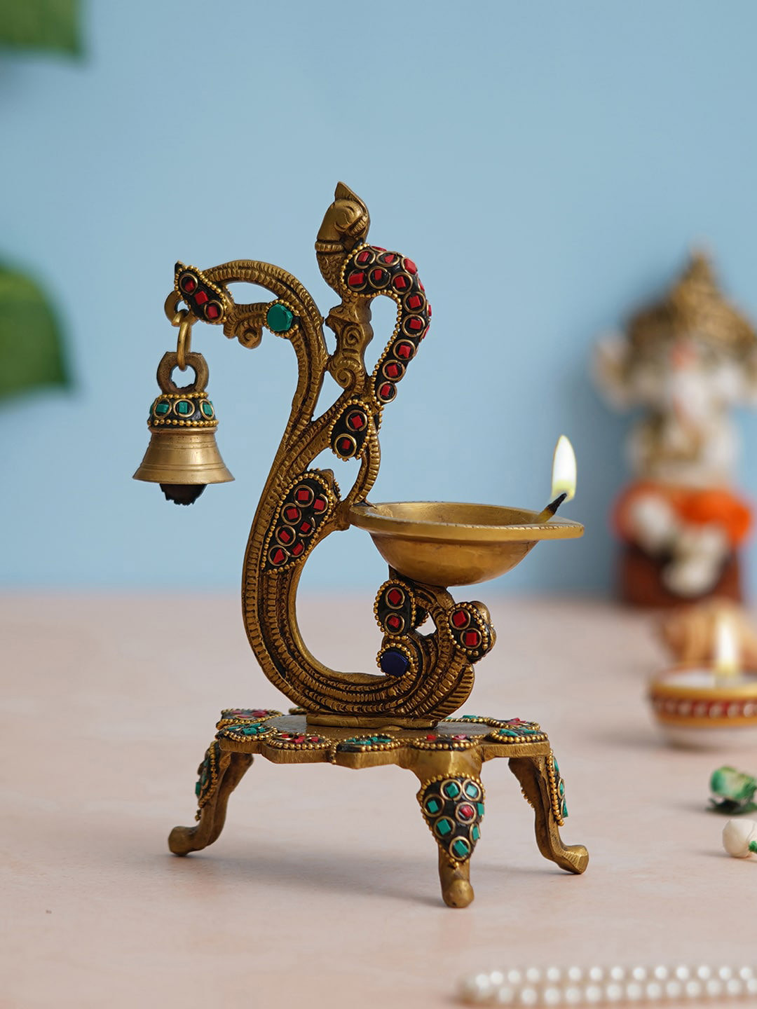 eCraftIndia Gold Toned Peacock Shaped Traditional Brass Diya With Bell & Stand