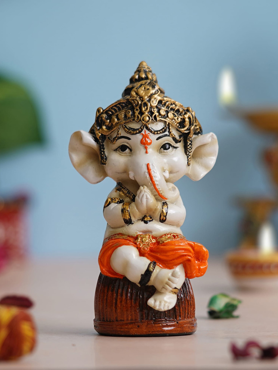 eCraftIndia Lord Ganesha Idol Sitting on Rock Orange Polyresin Glossy Prayer Room Hand-Crafted Medium Showpiece - 2.8 Inches