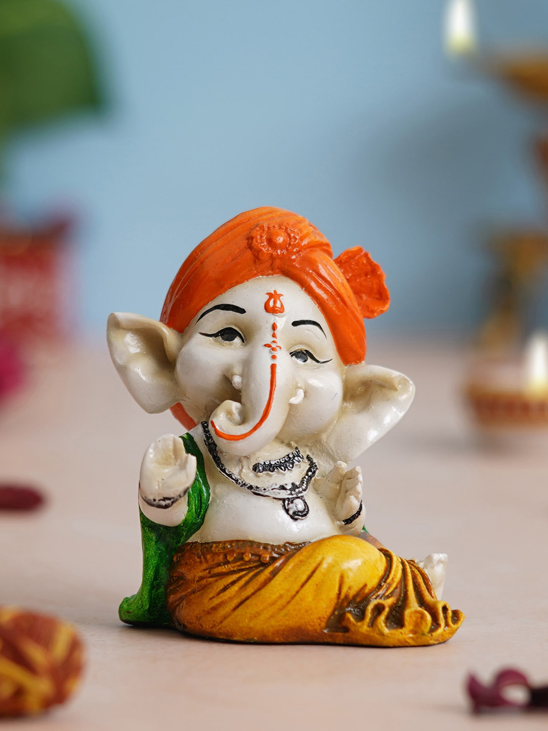 eCraftIndia Dancing Lord Ganesha Orange Polyresin Natural Prayer Room Hand-Crafted Medium Showpiece - 3 Inches