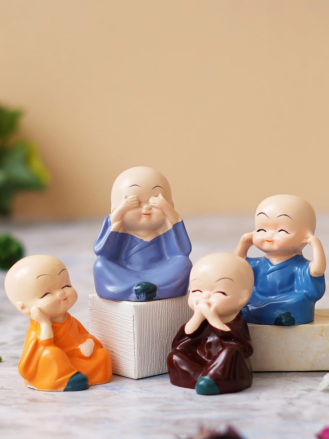 eCraftIndia Little Monk Buddha Orange Polyresin Glossy Living Room Set of 4 Medium Showpieces - 2 Inches