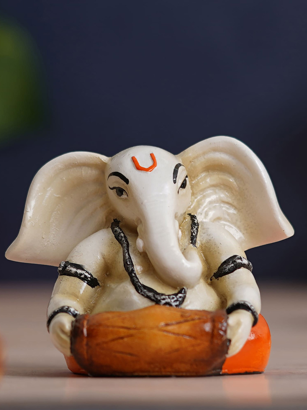 eCraftIndia Lord Ganesha Playing Dholak Off White Polyresin Natural Living Room Hand-Crafted Medium Showpiece - 3.1 Inches