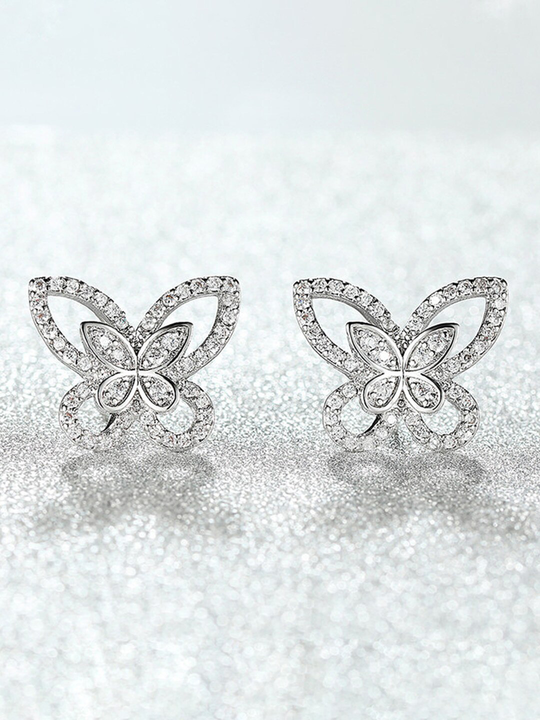 Jewels Galaxy Silver-Plated American Diamond-Studded Butterfly Shaped Stud Earrings