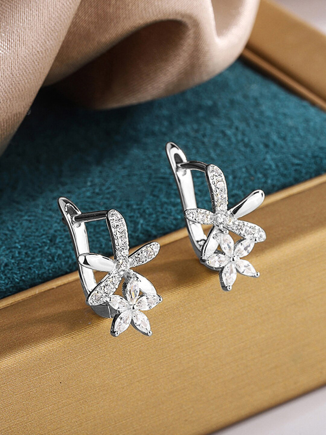 Jewels Galaxy Silver Plated American Diamond Studded Star Shaped Studs Earrings