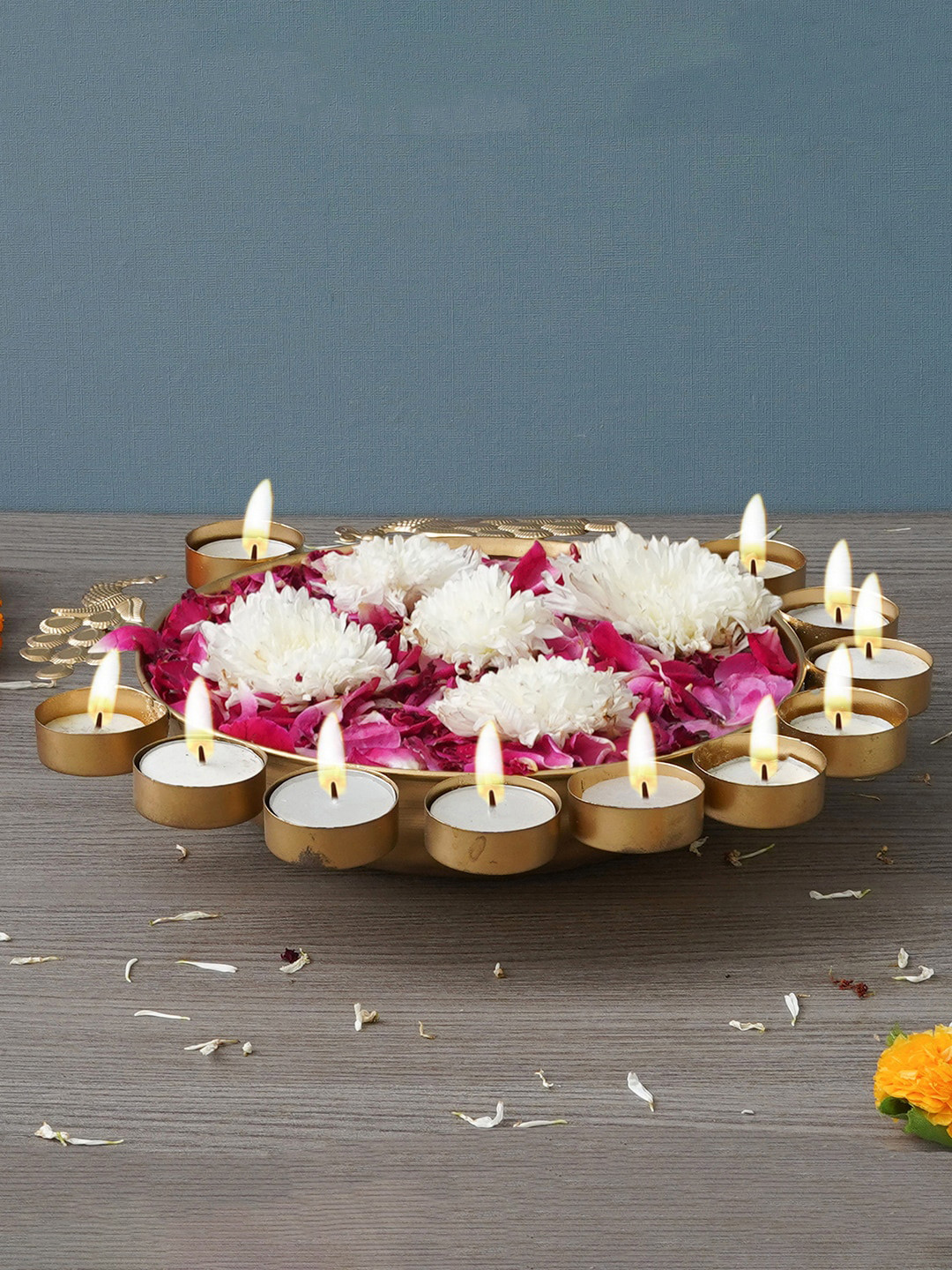 eCraftIndia Yellow Traditional Peacock Designer Urli With 11 Tea Light Holders