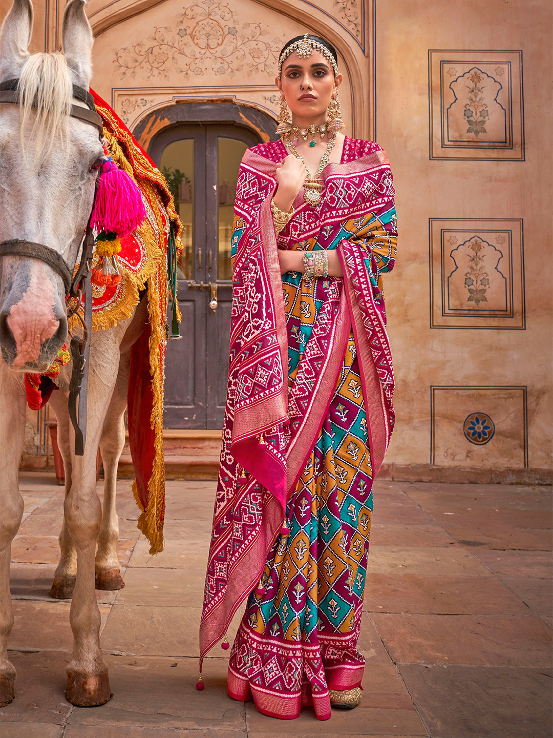 Mitera Pink & Blue Silk Blend Patola Saree