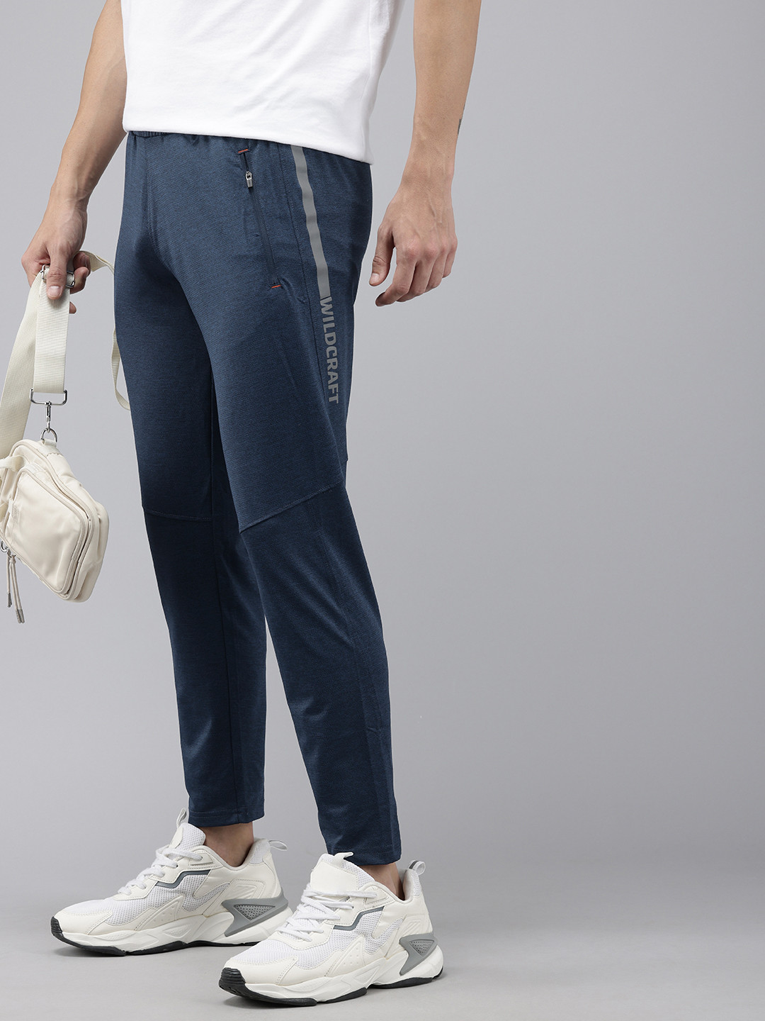 Wildcraft Men Brand Logo Printed Anti Odour Sports Track Pants