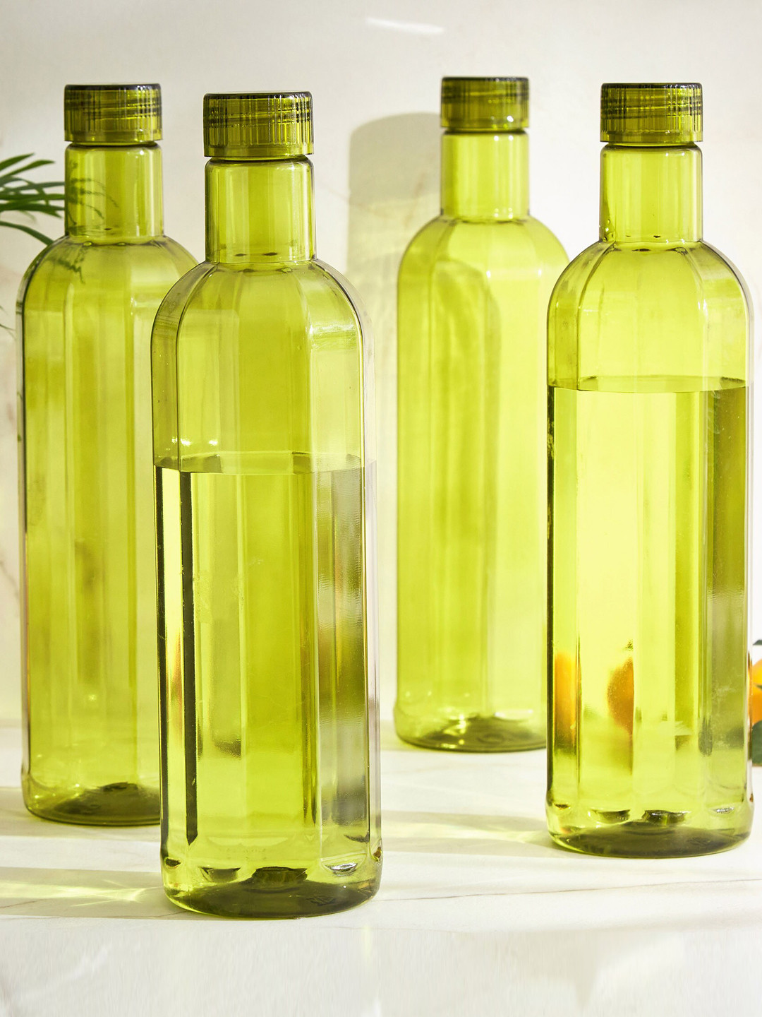 Home Centre Corsica 4 Pcs Fluorescent Green Fridge Bottles 1 L Each