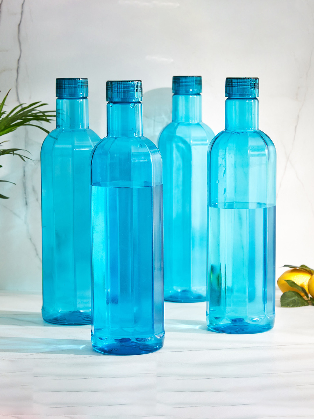 Home Centre Corsica 4 Pcs Blue Fridge Bottles 1 L Each