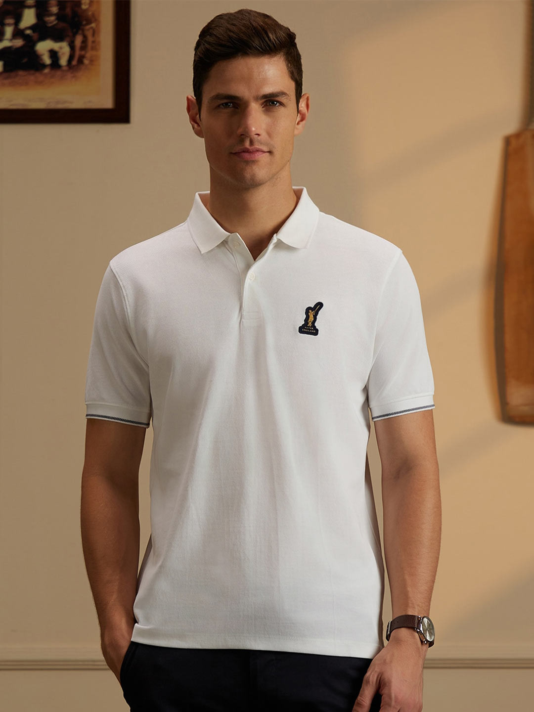 Peter England CasualsMen Regular fit cricket inspired Polo T-shirt