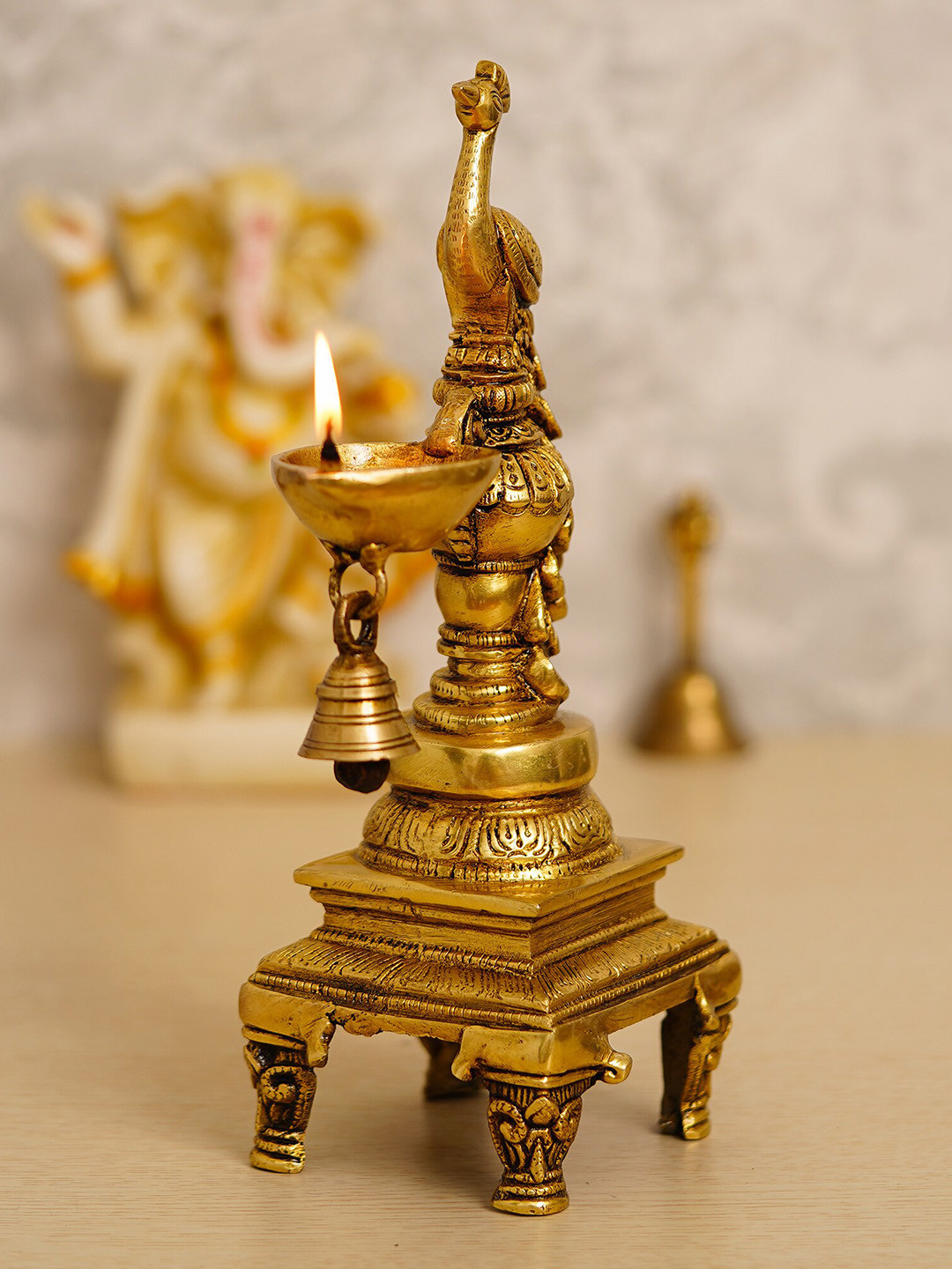 eCraftIndia Peacock Diya with Bell and Stand Beige Metal Metallic Living Room Hand-Crafted Small Showpiece - 3.5 Inches