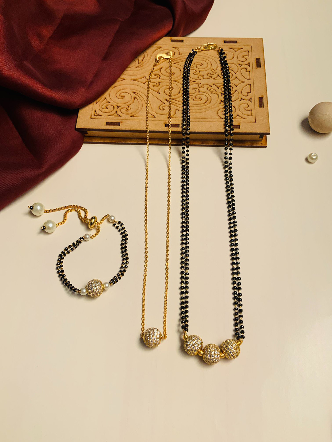 ABDESIGNS Set Of 3 Gold-Plated AD Studded Mangalsutra With Pendant Chain & Bracelet
