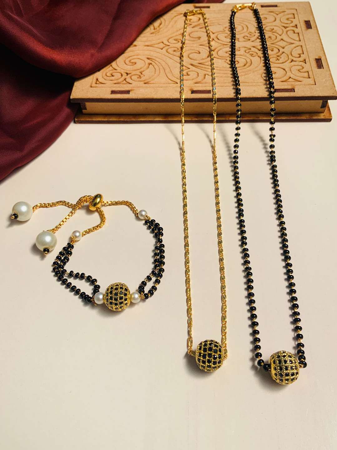 ABDESIGNS Set Of 3 Gold-Plated AD Studded Mangalsutra With Pendant Chain & Bracelet