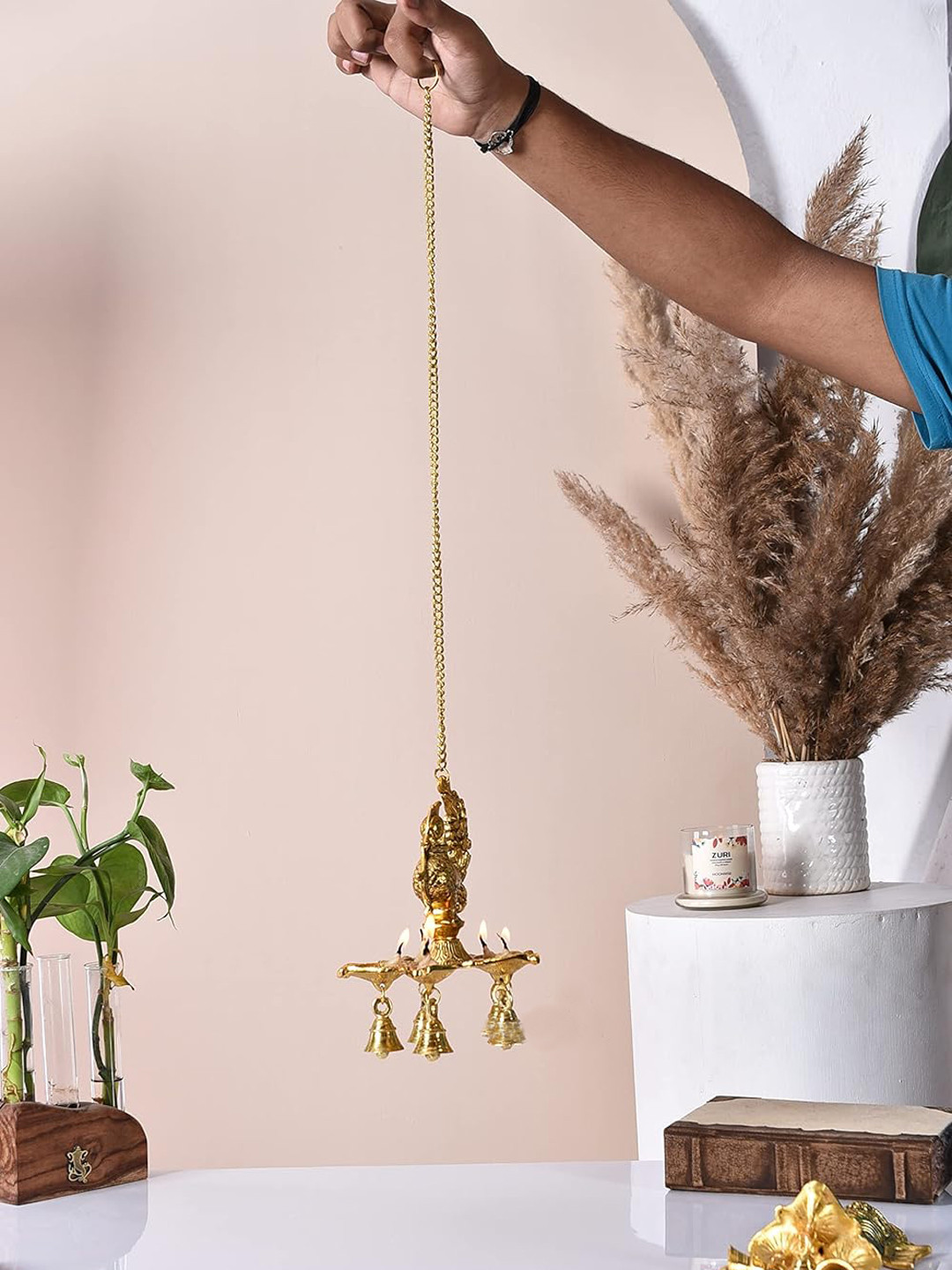 Ascension Gold-Toned Peacock Diya with Bells & Chain