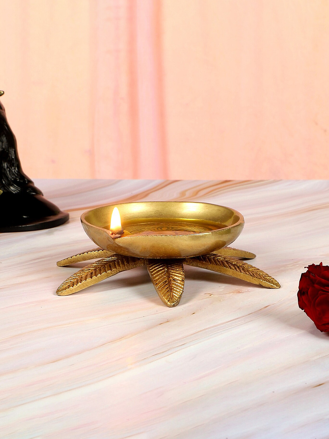 Two Moustaches Gold-Toned Brass Oil Diya Bowl Over Five Leaves Base