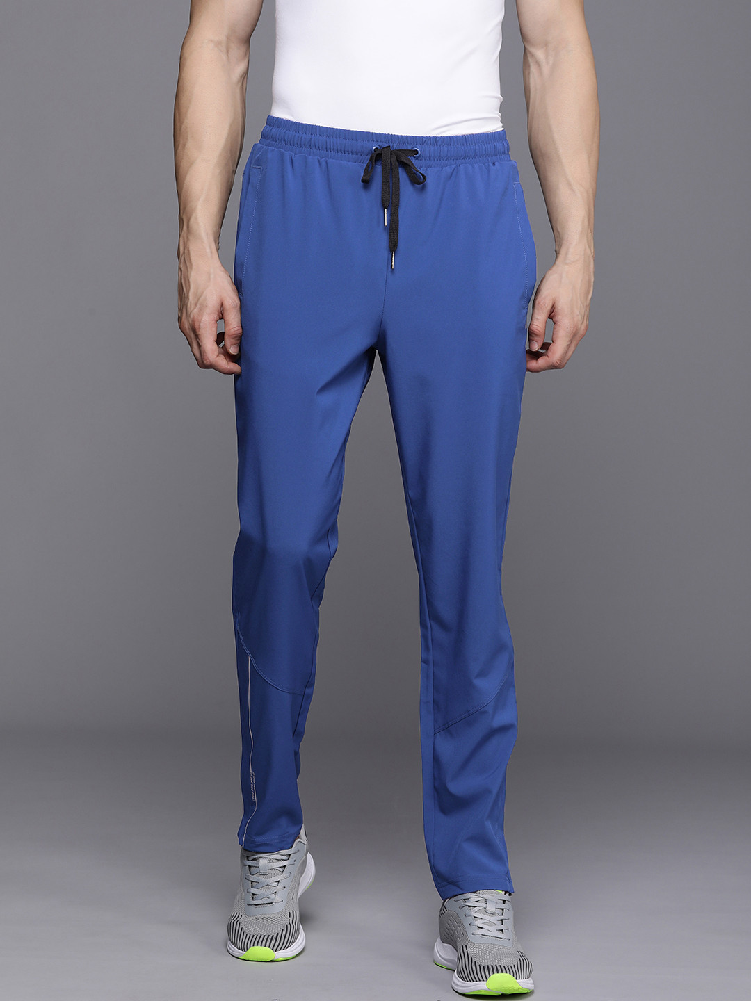 Louis Philippe ATHPLAY Men Solid Slim Fit Mid-Rise Track Pants With Reflective Strips