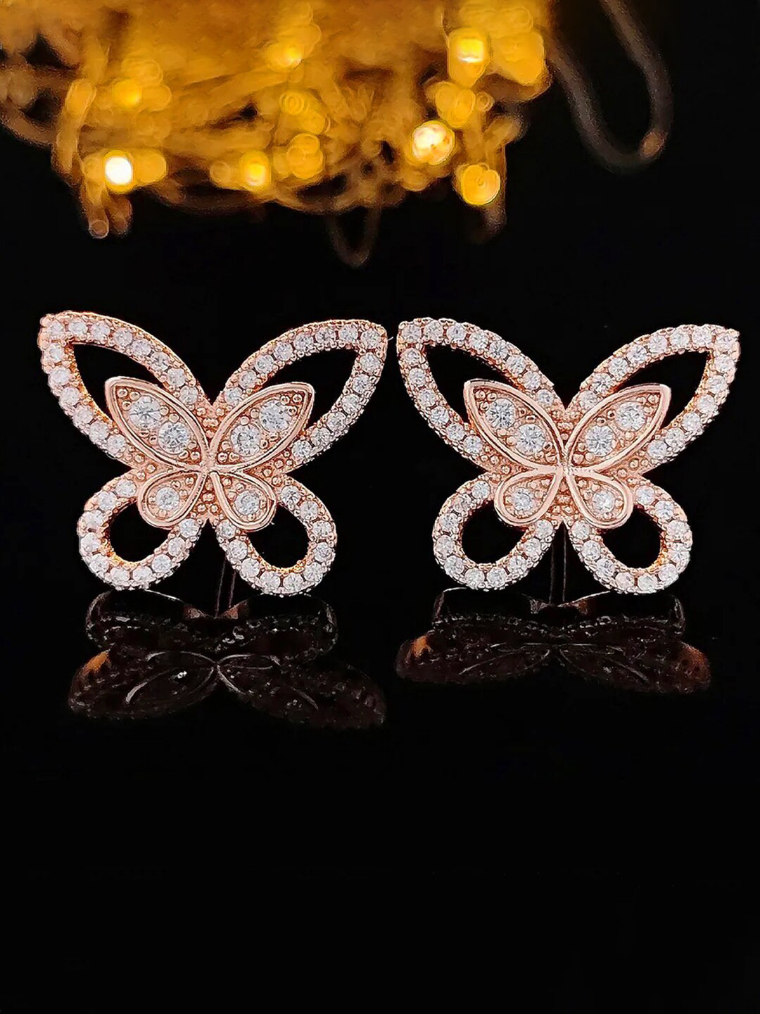 Jewels Galaxy Rose Gold Plated American Diamond Studded Butterfly Shaped Studs Earrings