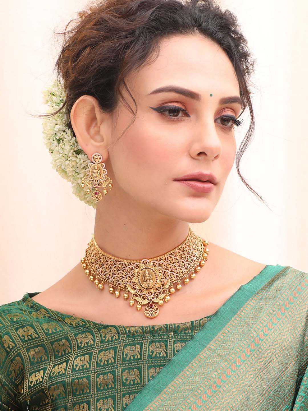 Tarinika Neelam Gold-Plated CZ-Studded AntiqueChoker Jewellery Set
