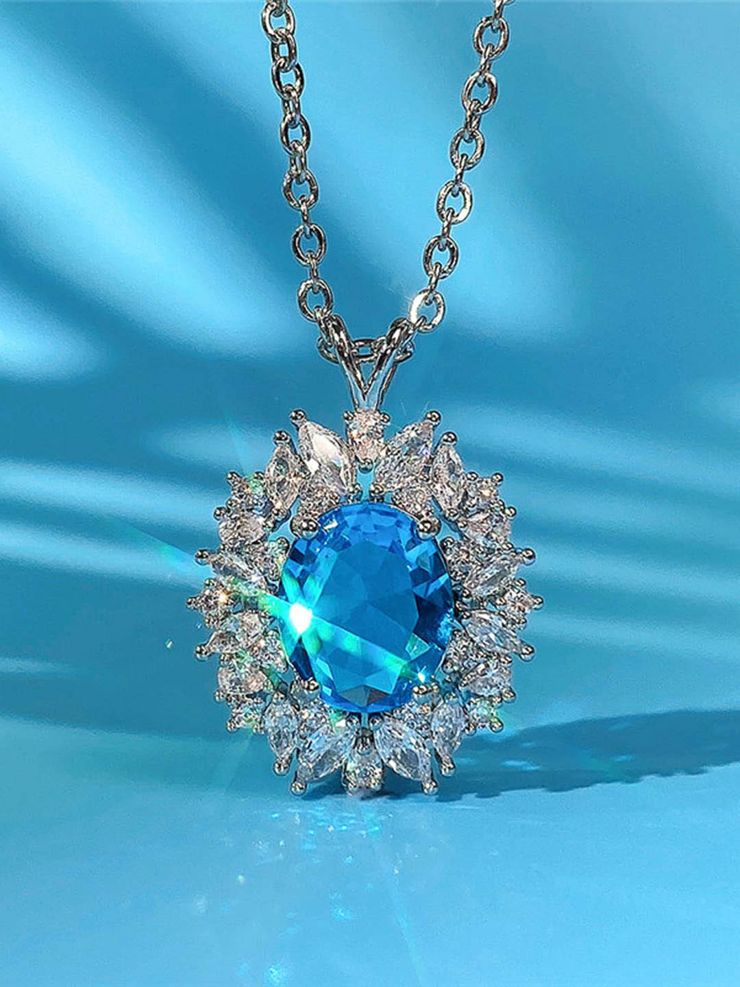 Designs & You Silver-Plated AD-Studded Oval Pendant With Chain