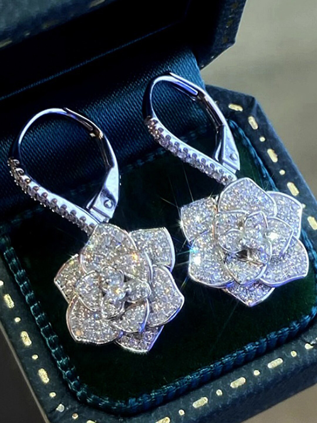 Designs & You Silver-Plated Floral American Diamond Studded Drop Earrings