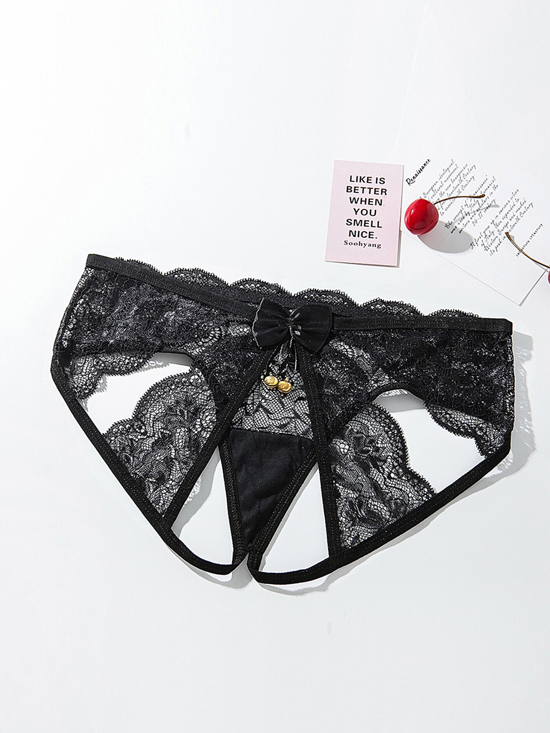 LULU & SKY Mid-Rise Cut-Out Lace Thongs