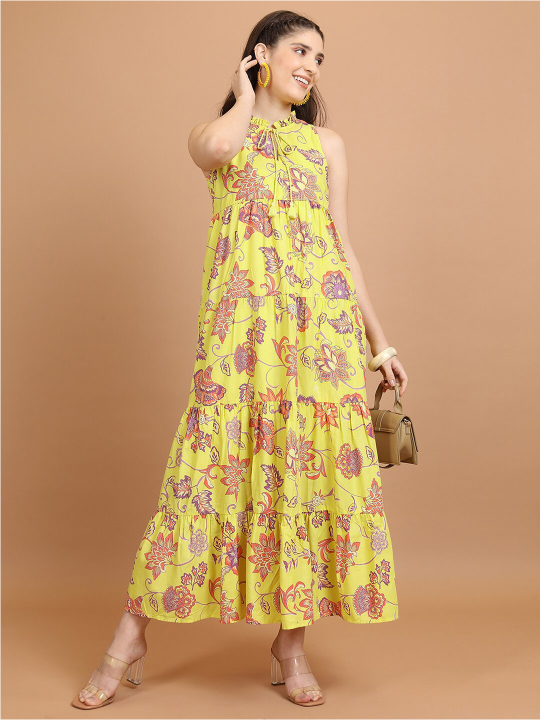 Vishudh Yellow Floral Printed Sleeveless Tie-Up Neck Tiered Maxi Dress