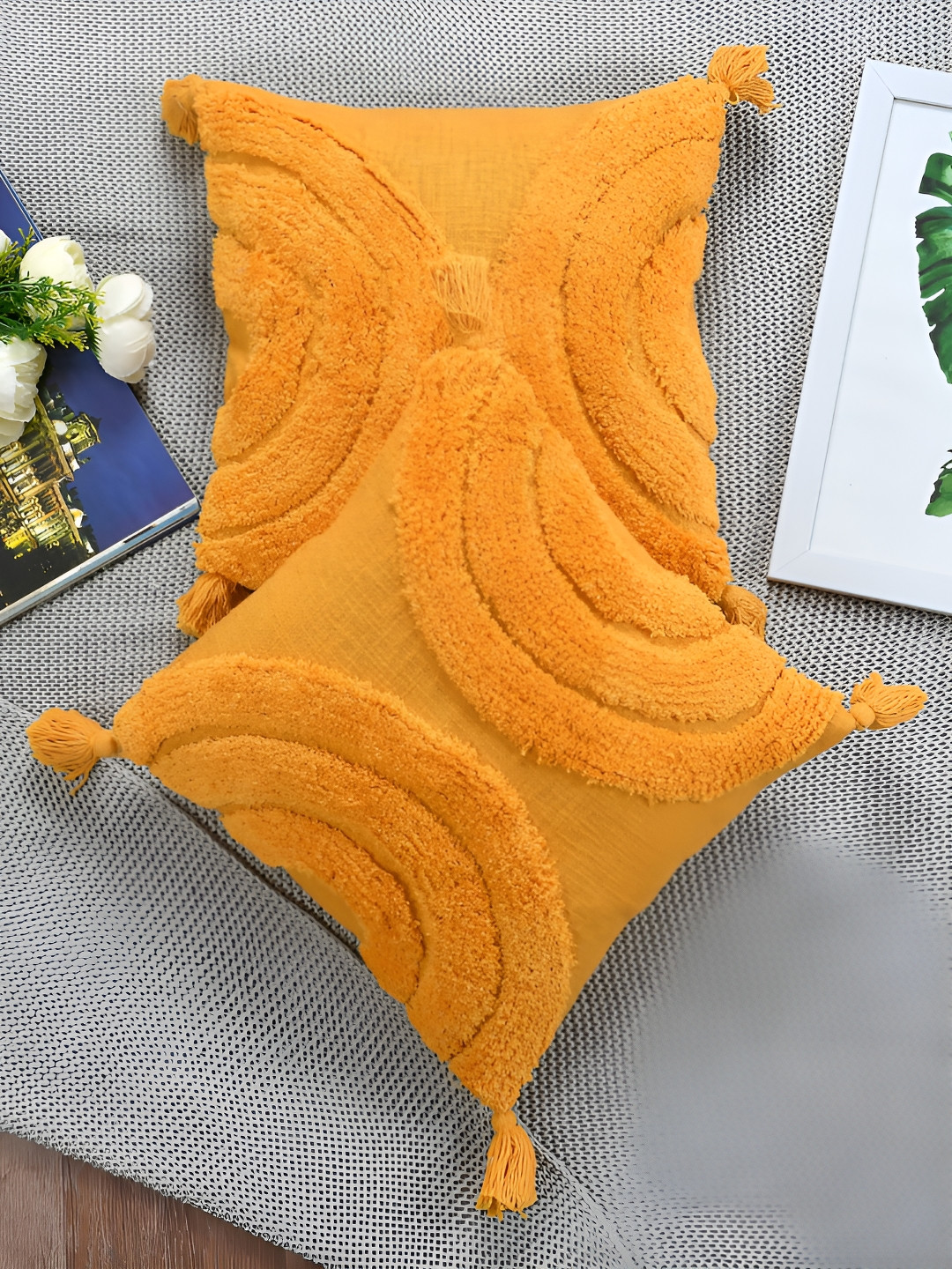 HOMADORN Mustard 2 Pieces Self Design Cotton Square Cushion Covers with Tassels