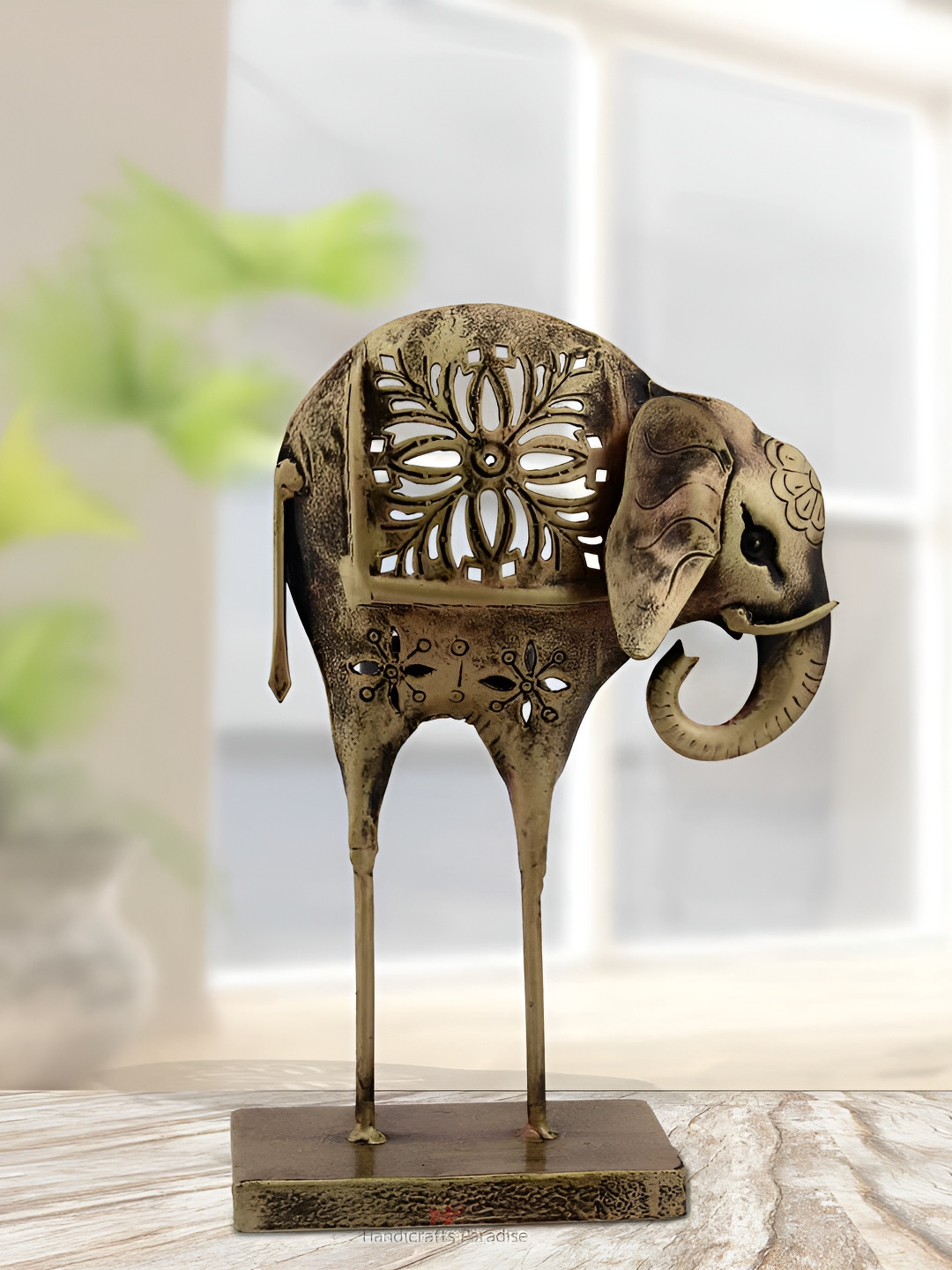 HANDICRAFTS PARADISE Bronze Figurine Cut Work Long Leg Elephant Tea Light holder Showpiece