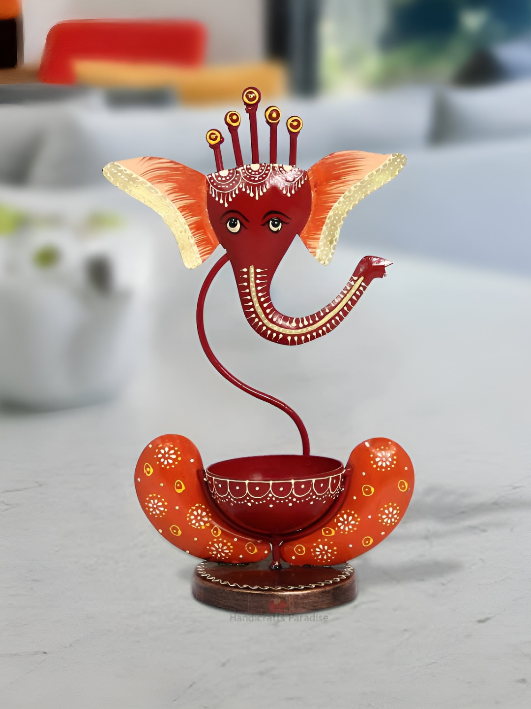 HANDICRAFTS PARADISE Lord Ganesha Tea Light Orange Metal Glossy Prayer Room Hand-Painted Medium Showpiece - 11 Inches