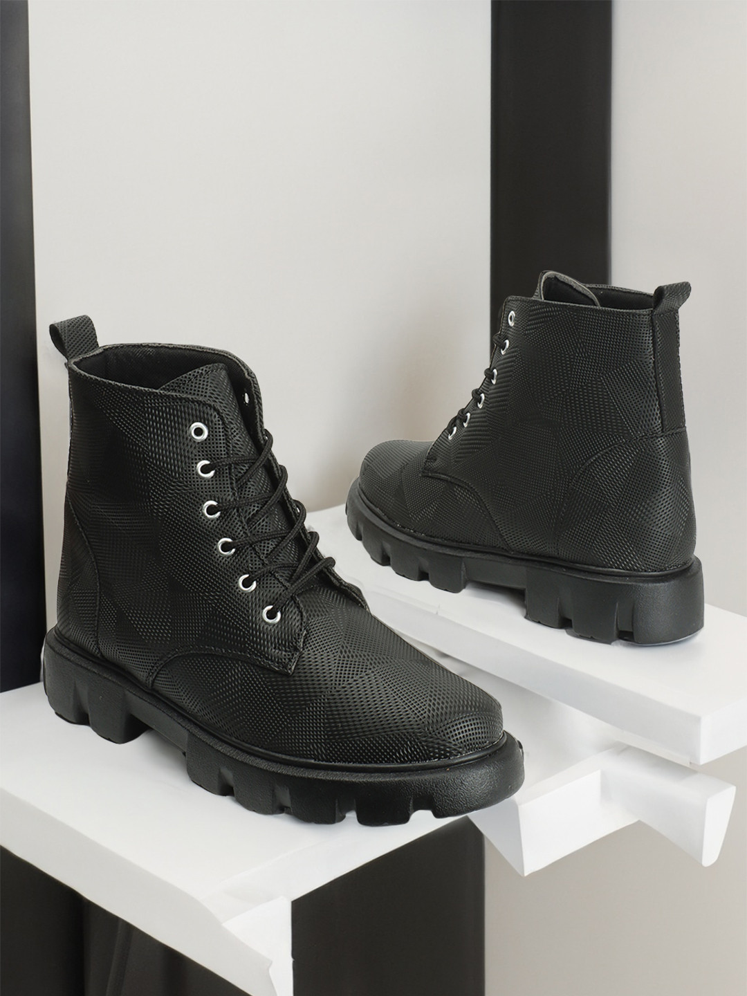 The Roadster Lifestyle Co.Women Black Mid Top Textured Platform Heel Chunky Boots