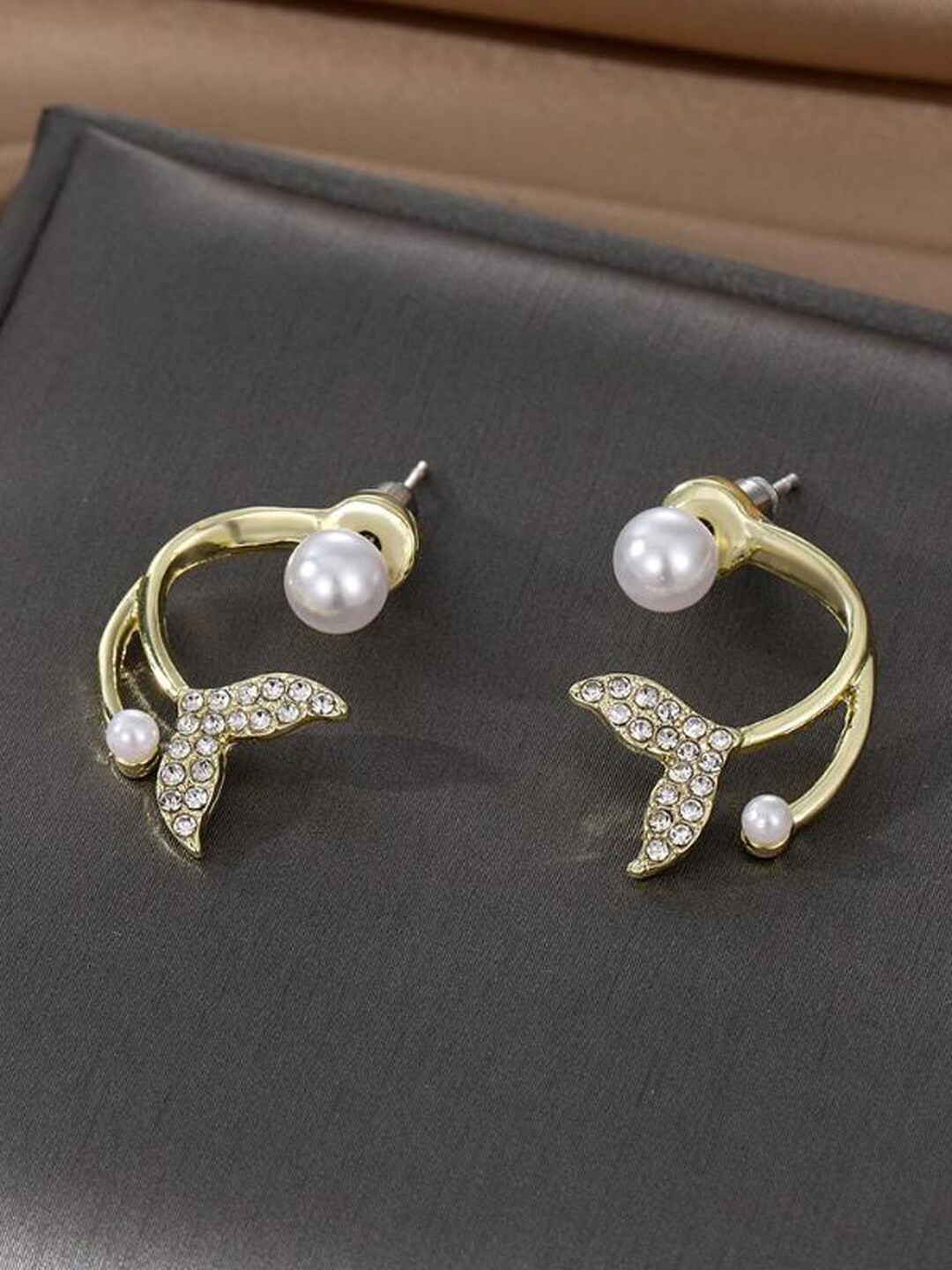 VAGHBHATT Gold-Plated Pearl-Studded Fish Tail Contemporary Stud Earrings