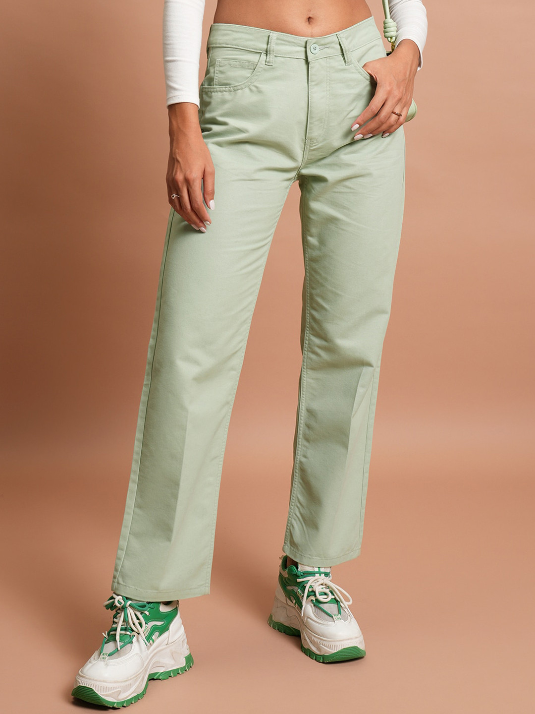 Tokyo Talkies Women Green Flared Mid-Rise Plain Regular Trousers