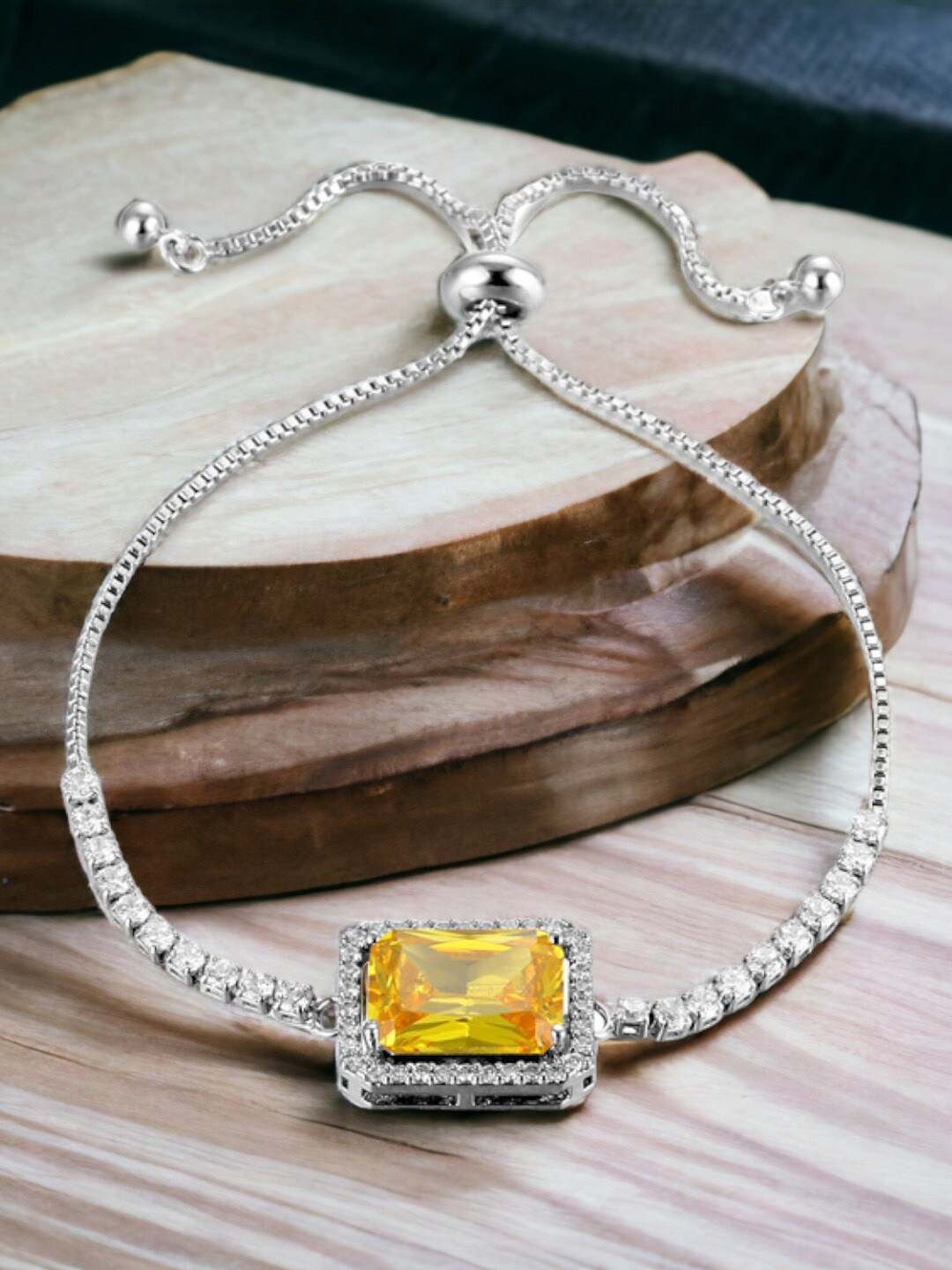 Jewels Galaxy Silver Plated Rectangular Crystal Studded Matrix Tennis Bracelet