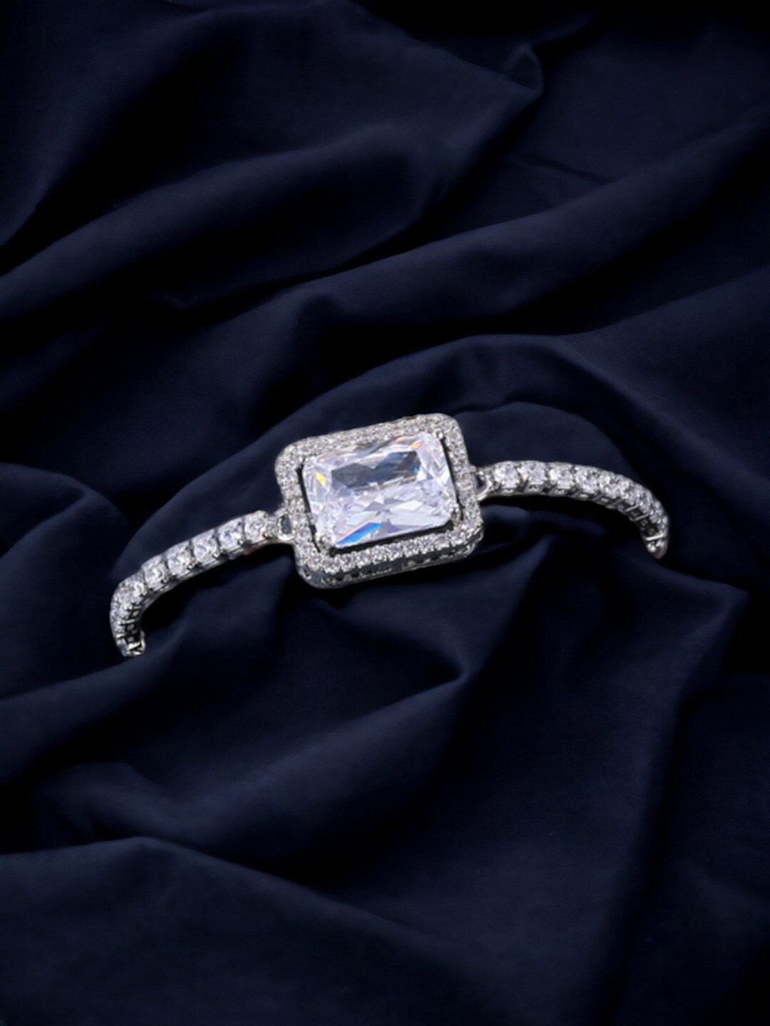 Jewels Galaxy Silver Plated Rectangular Crystal Studded Matrix Tennis Bracelet