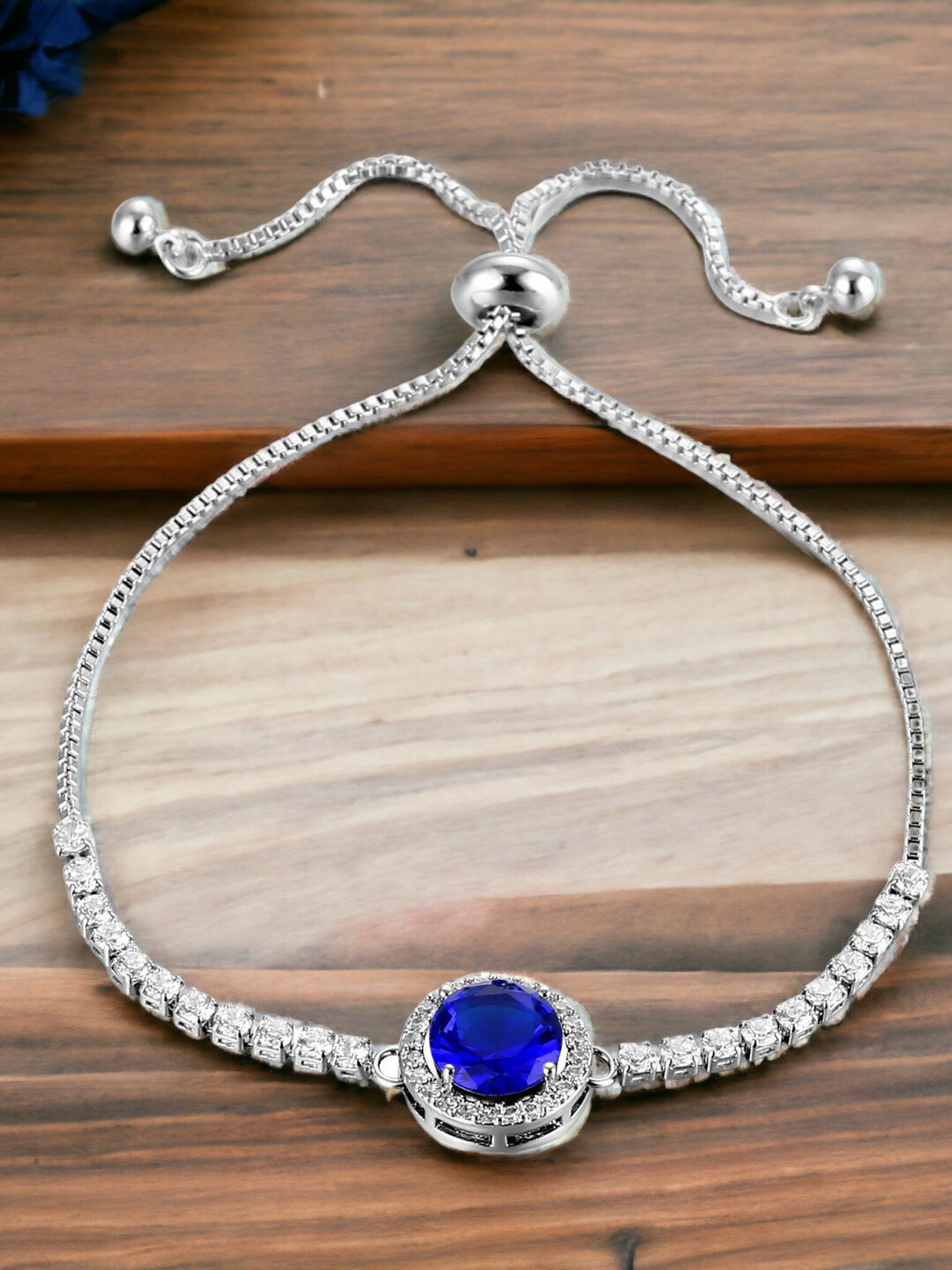 Jewels Galaxy Silver Plated Round Crystal Studded Matrix Tennis Bracelet