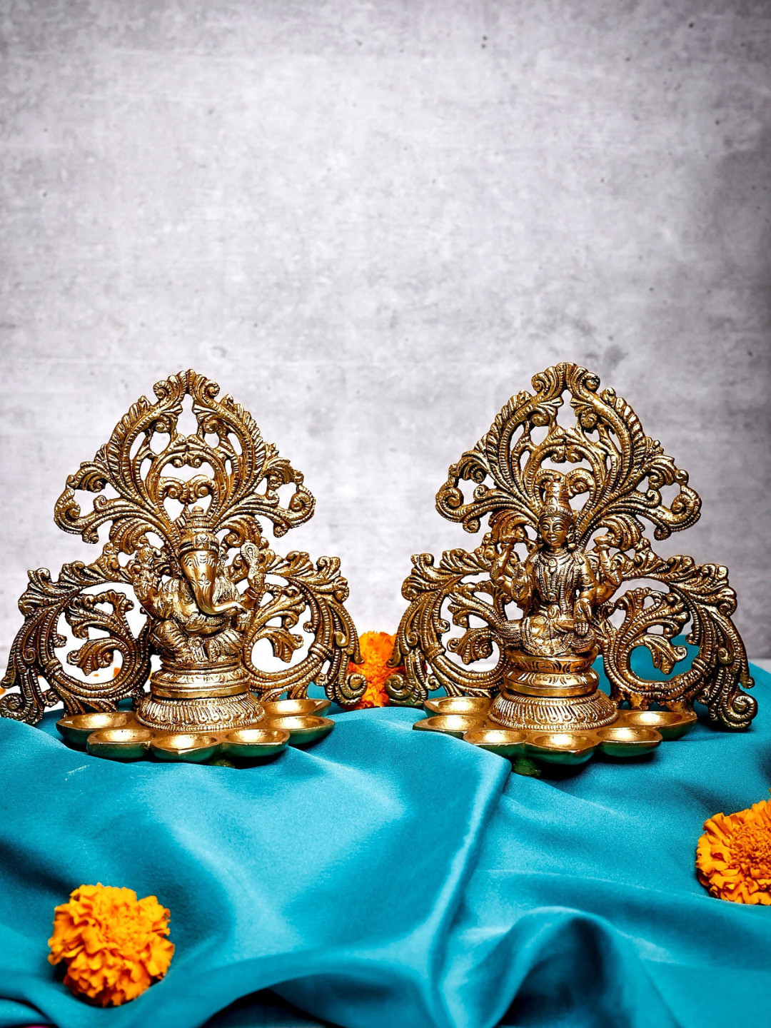 The Advitya Gold Toned Ganesha Laxmi 6 Diya Brass Religious Idol Showpiece