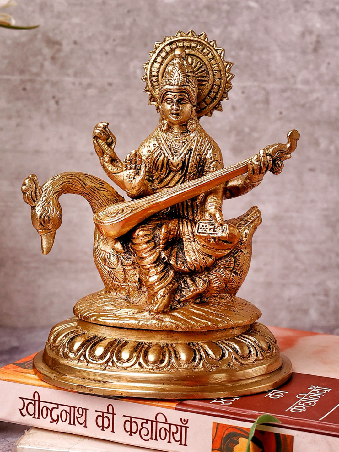 The Advitya Goddess Saraswati Sitting on Hans Gold Brass Metallic Living Room Small Showpiece - 6.9 Inches