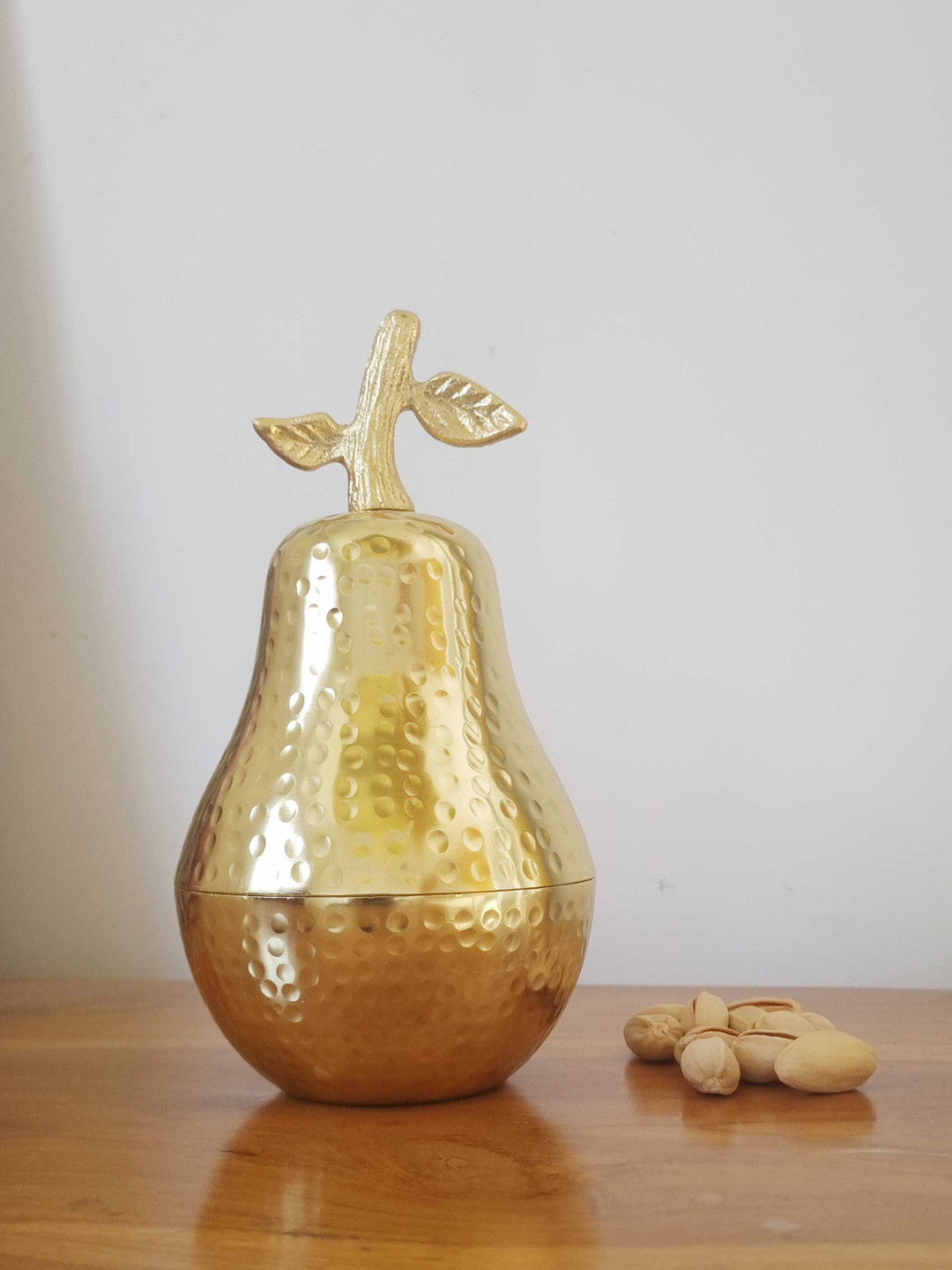 Folkstorys Gold Toned Pear Shape Candle Holder