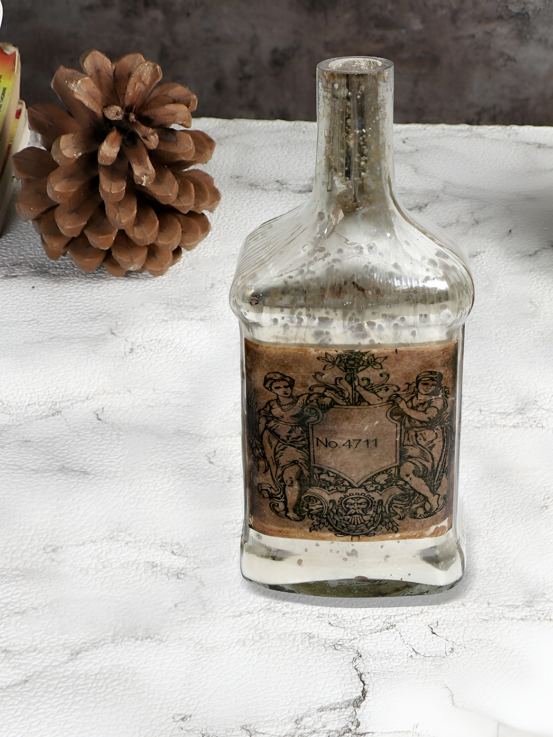 Decor de Maison Legacy Bottle Silver Glass Glossy Home Office Tiny Showpiece - 3.5 Inches