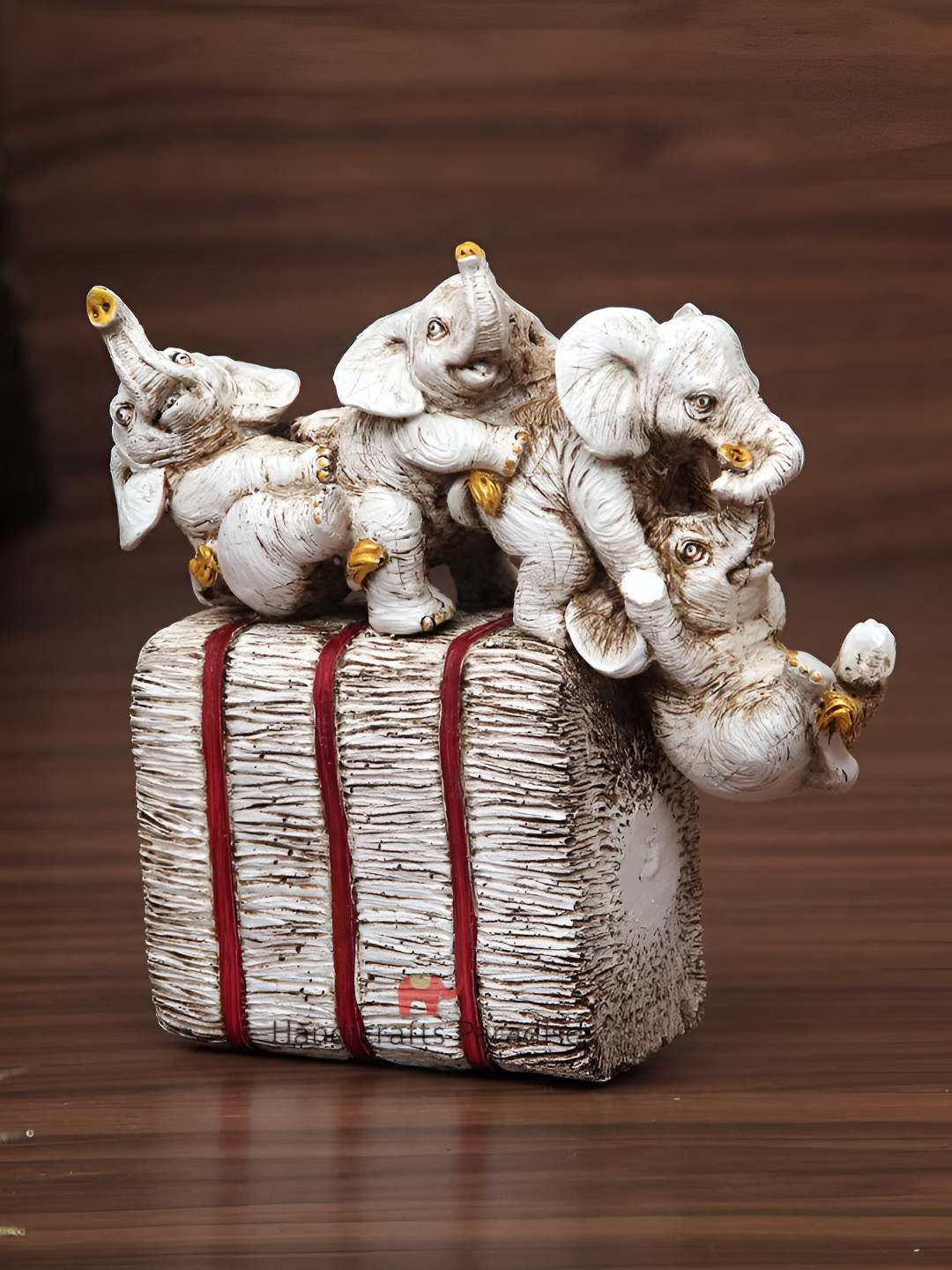 HANDICRAFTS PARADISE Four Circus Elephant White Polyresin Glossy Living Room Medium Showpiece - 6.7 Inches