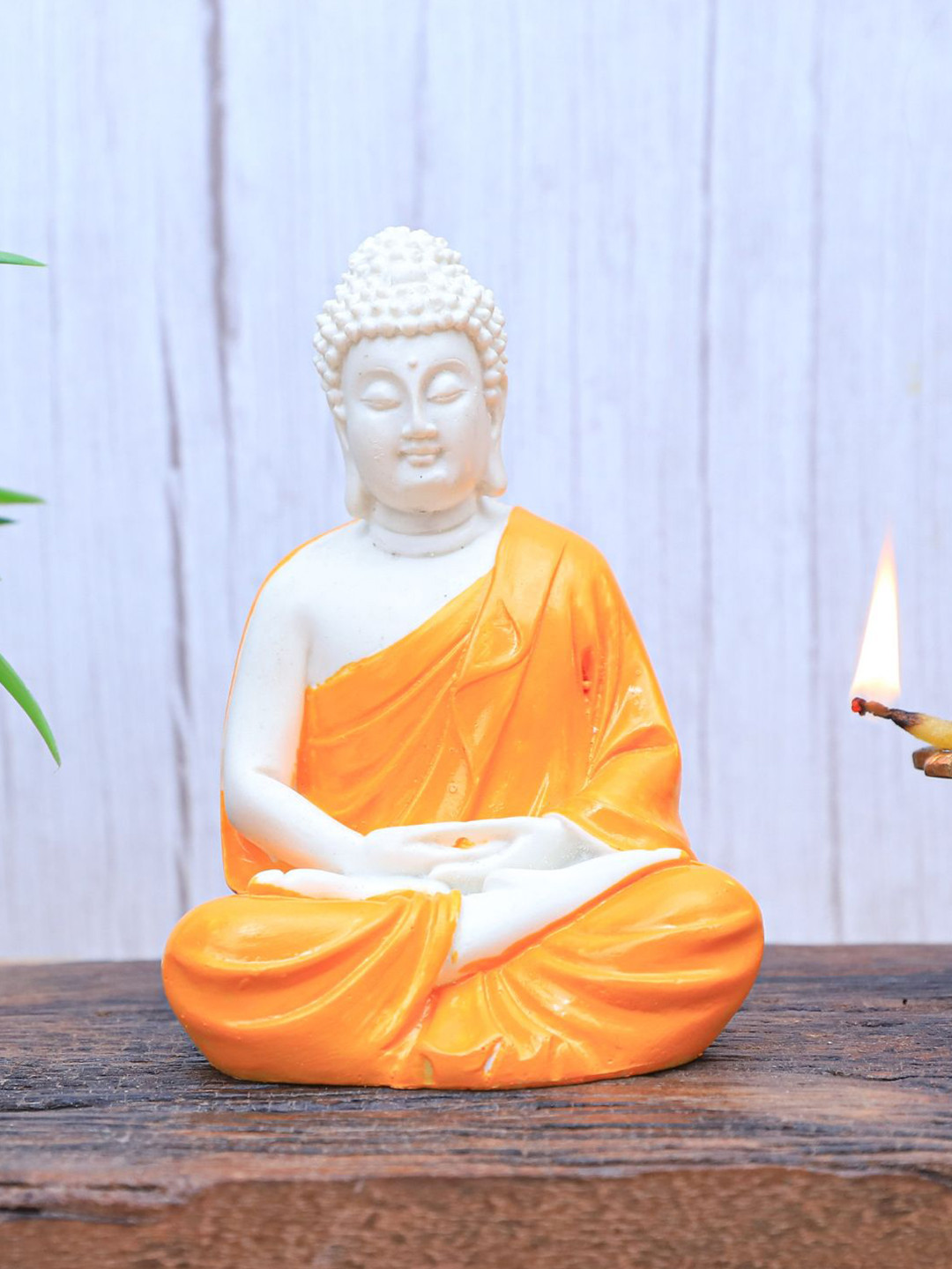 The Advitya Meditating Buddha Sitting Orange Polyresin Glossy Prayer Room Small Showpiece - 5.5 Inches