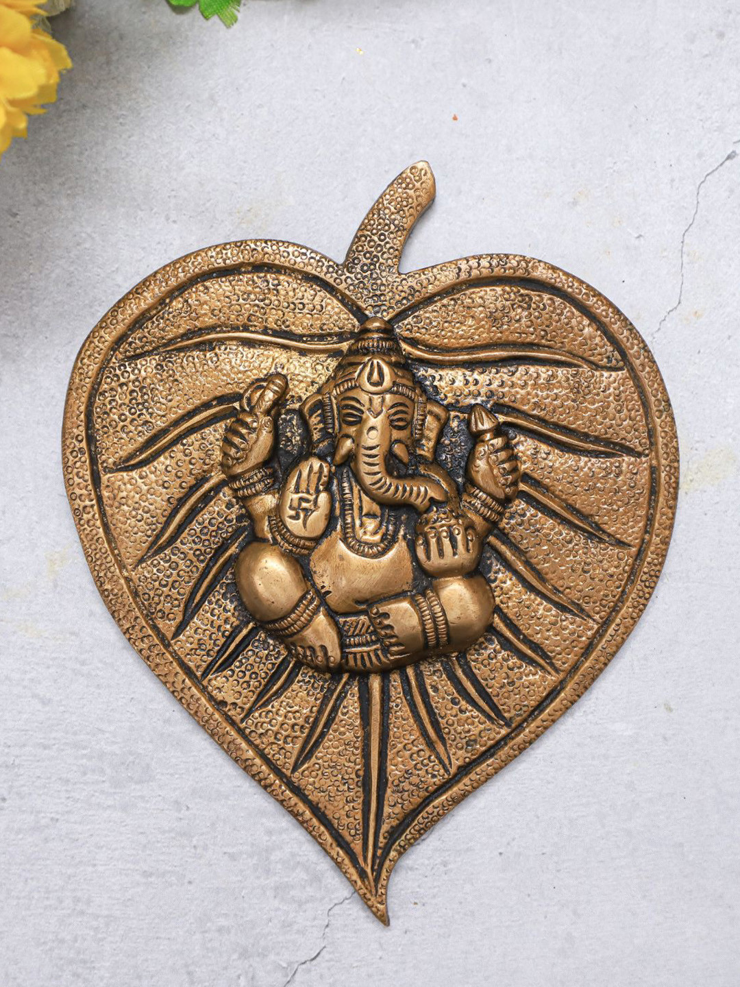 The Advitya Hanging Ganesha Leaf Gold Brass Metallic Prayer Room Small Showpiece - 5.5 Inches