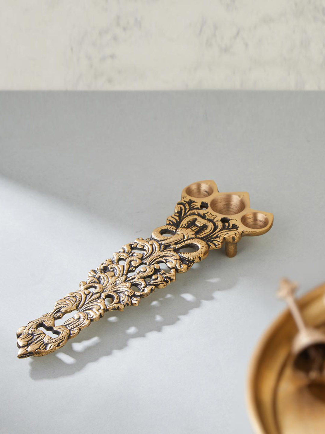 Fabindia Gold Toned Brass Mehnoor Oil Lamp