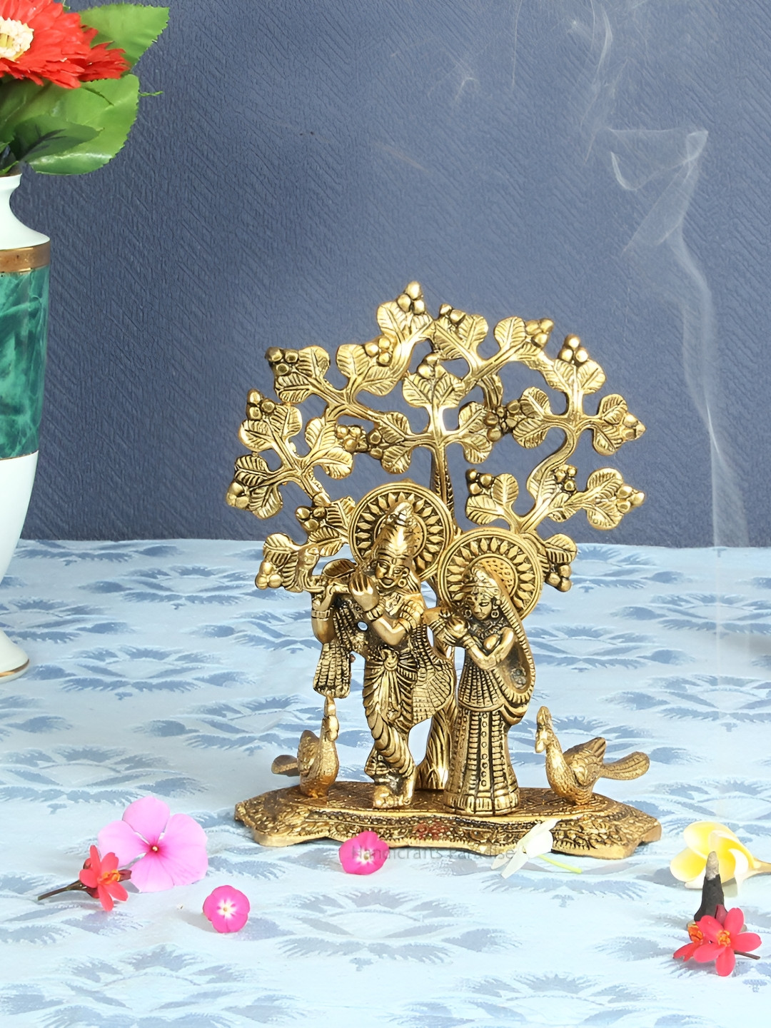 HANDICRAFTS PARADISE Radha Krishna Standing on Base with Peacocks and a Tree in Backdrop Gold Metal Metallic Prayer Room Medium Showpiece - 3 Inches