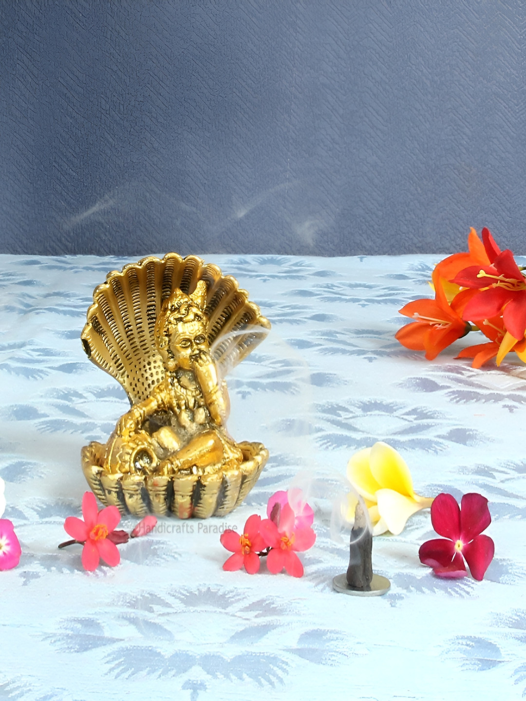 HANDICRAFTS PARADISE Bal Krishna Seated in Shell Gold Metal Metallic Prayer Room Tiny Showpiece - 2.7 Inches