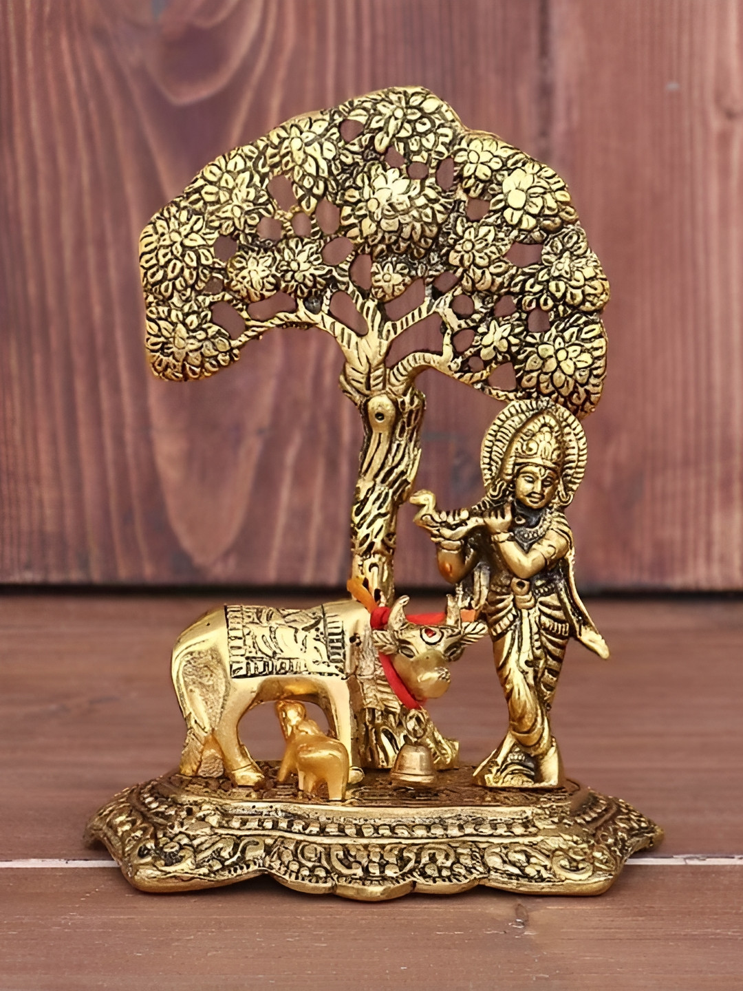 Navyaksh Kamdhenu Cow with Krishna Standing Under Tree Gold Metal Metallic Prayer Room Small Showpiece - 4.3 Inches