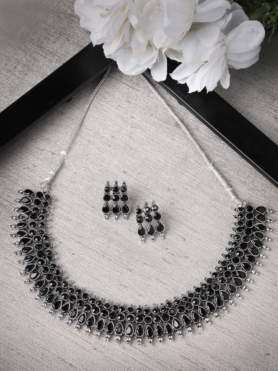 Sukkhi Rhodium Plated AD Studded Oxdised Necklace and Earrings Set
